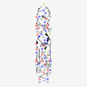 N-[3-[(3-amino-3-oxoprop-1-en-2-yl)amino]-3-oxoprop-1-en-2-yl]-2-[(1S,8R,11Z,15R,18R,25R,26S,35S,37R,46S,53R,59R)-18-[(2R,3S)-2,3-dihydroxybutan-2-yl]-11-ethylidene-59-hydroxy-8,31-bis[(1R)-1-hydroxyethyl]-26,46-dimethyl-40,43-dimethylidene-6,9,16,23,28,38,41,44,47-nonaoxo-37-propan-2-yl-27-oxa-3,13,20,56-tetrathia-7,10,17,24,36,39,42,45,48,52,58,61,62,63,64-pentadecazanonacyclo[23.23.9.329,35.12,5.112,15.119,22.154,57.01,53.032,60]tetrahexaconta-2(64),4,12(63),19(62),21,29(61),30,32(60),33,51,54,57-dodecaen-51-yl]-1,3-thiazole-4-carboxamide