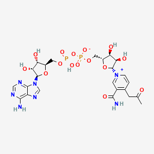 molecular formula C24H31N7O15P2 B10777966 1-((2R,3R,4S,5R)-5-((((((((2R,3S,4R,5R)-5-(6-Amino-9H-purin-9-yl)-3,4-dihydroxytetrahydrofuran-2-yl)methoxy)(hydroxy)phosphoryl)oxy)oxidophosphoryl)oxy)methyl)-3,4-dihydroxytetrahydrofuran-2-yl)-3-carbamoyl-4-(2-oxopropyl)pyridin-1-ium 