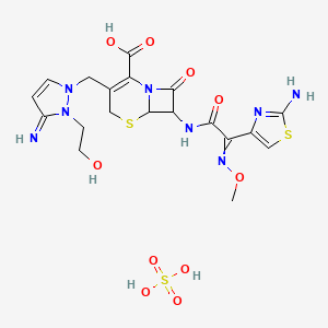 molecular formula C19H24N8O10S3 B10779411 7-[[2-(2-Amino-1,3-thiazol-4-yl)-2-methoxyiminoacetyl]amino]-3-[[2-(2-hydroxyethyl)-3-iminopyrazol-1-yl]methyl]-8-oxo-5-thia-1-azabicyclo[4.2.0]oct-2-ene-2-carboxylic acid;sulfuric acid 