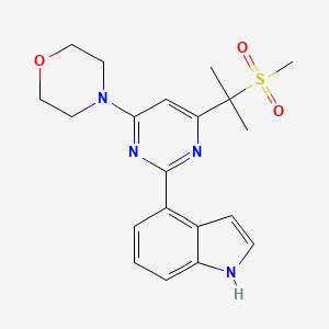 molecular formula C20H24N4O3S B10780039 4-[2-(1H-indol-4-yl)-6-(2-methylsulfonylpropan-2-yl)pyrimidin-4-yl]morpholine 