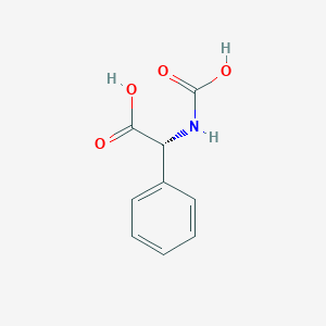 molecular formula C9H9NO4 B10797992 (2R)-2-(carboxyamino)-2-phenylacetic acid 