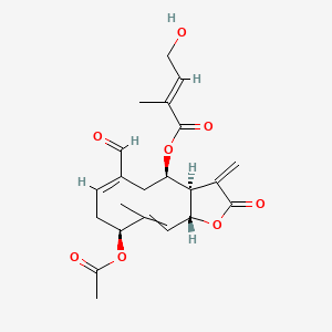 molecular formula C22H26O8 B10831892 [(3aR,4R,6E,9S,11aR)-9-acetyloxy-6-formyl-10-methyl-3-methylidene-2-oxo-3a,4,5,8,9,11a-hexahydrocyclodeca[b]furan-4-yl] (E)-4-hydroxy-2-methylbut-2-enoate 