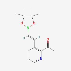 molecular formula C15H20BNO3 B10832514 1-[3-[(E)-2-(4,4,5,5-tetramethyl-1,3,2-dioxaborolan-2-yl)ethenyl]pyridin-2-yl]ethanone 