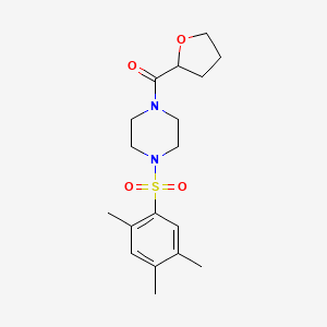 Tetrahydrofuran-2-yl{4-[(2,4,5-trimethylphenyl)sulfonyl]piperazin-1-yl}methanone