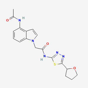 2-(4-acetamido-1H-indol-1-yl)-N-(5-(tetrahydrofuran-2-yl)-1,3,4-thiadiazol-2-yl)acetamide