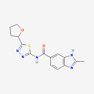 2-methyl-N-[5-(tetrahydrofuran-2-yl)-1,3,4-thiadiazol-2-yl]-1H-benzimidazole-5-carboxamide