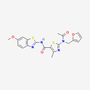 molecular formula C20H18N4O4S2 B11015390 2-[acetyl(furan-2-ylmethyl)amino]-N-[(2E)-6-methoxy-1,3-benzothiazol-2(3H)-ylidene]-4-methyl-1,3-thiazole-5-carboxamide 