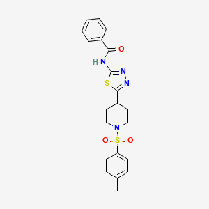 molecular formula C21H22N4O3S2 B11058201 N-(5-{1-[(4-methylphenyl)sulfonyl]piperidin-4-yl}-1,3,4-thiadiazol-2-yl)benzamide 