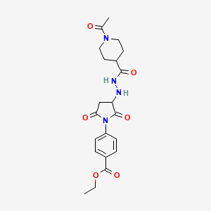 molecular formula C21H26N4O6 B11066726 Ethyl 4-(3-{2-[(1-acetylpiperidin-4-yl)carbonyl]hydrazinyl}-2,5-dioxopyrrolidin-1-yl)benzoate 