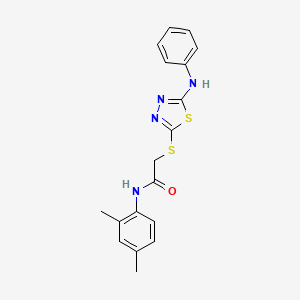 molecular formula C18H18N4OS2 B11082411 2-[(5-anilino-1,3,4-thiadiazol-2-yl)sulfanyl]-N-(2,4-dimethylphenyl)acetamide 