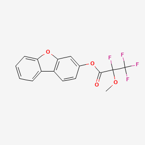 molecular formula C16H10F4O4 B11085978 Dibenzo[b,d]furan-3-yl 2,3,3,3-tetrafluoro-2-methoxypropanoate 