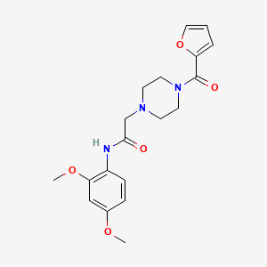 N-(2,4-dimethoxyphenyl)-2-[4-(furan-2-carbonyl)piperazin-1-yl]acetamide