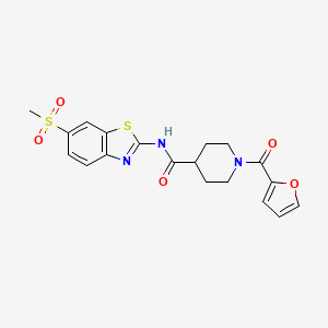 molecular formula C19H19N3O5S2 B11172295 1-(furan-2-ylcarbonyl)-N-[6-(methylsulfonyl)-1,3-benzothiazol-2-yl]piperidine-4-carboxamide 