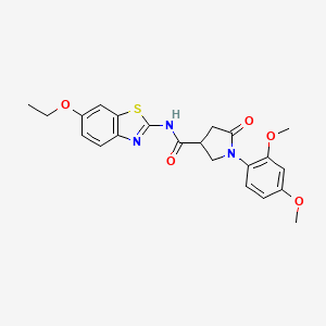 1-(2,4-dimethoxyphenyl)-N-(6-ethoxy-1,3-benzothiazol-2-yl)-5-oxopyrrolidine-3-carboxamide