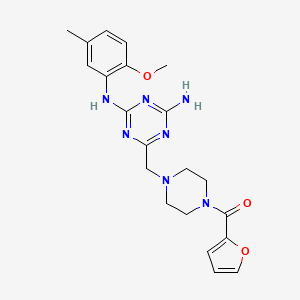 [4-({4-Amino-6-[(2-methoxy-5-methylphenyl)amino]-1,3,5-triazin-2-yl}methyl)piperazin-1-yl](furan-2-yl)methanone