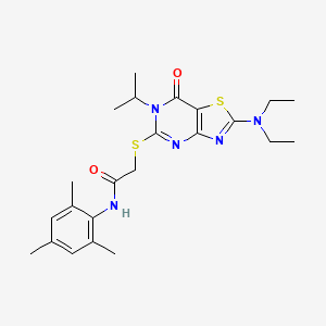 2-{[2-(diethylamino)-7-oxo-6-(propan-2-yl)-6,7-dihydro[1,3]thiazolo[4,5-d]pyrimidin-5-yl]sulfanyl}-N-(2,4,6-trimethylphenyl)acetamide