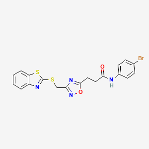 molecular formula C19H15BrN4O2S2 B11237537 3-{3-[(1,3-benzothiazol-2-ylsulfanyl)methyl]-1,2,4-oxadiazol-5-yl}-N-(4-bromophenyl)propanamide 