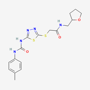 2-[(5-{[(4-Methylphenyl)carbamoyl]amino}-1,3,4-thiadiazol-2-YL)sulfanyl]-N-[(oxolan-2-YL)methyl]acetamide