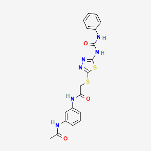 molecular formula C19H18N6O3S2 B11241624 N-(3-Acetamidophenyl)-2-({5-[(phenylcarbamoyl)amino]-1,3,4-thiadiazol-2-YL}sulfanyl)acetamide 