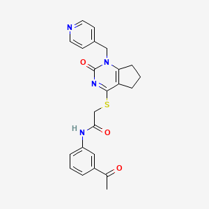 molecular formula C23H22N4O3S B11245208 N-(3-acetylphenyl)-2-((2-oxo-1-(pyridin-4-ylmethyl)-2,5,6,7-tetrahydro-1H-cyclopenta[d]pyrimidin-4-yl)thio)acetamide 