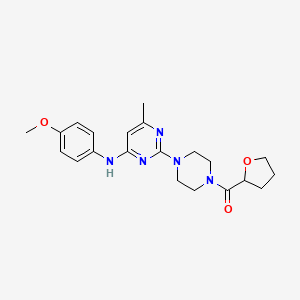 molecular formula C21H27N5O3 B11248264 (4-(4-((4-Methoxyphenyl)amino)-6-methylpyrimidin-2-yl)piperazin-1-yl)(tetrahydrofuran-2-yl)methanone 