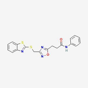 molecular formula C19H16N4O2S2 B11254444 3-{3-[(1,3-benzothiazol-2-ylsulfanyl)methyl]-1,2,4-oxadiazol-5-yl}-N-phenylpropanamide 