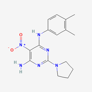 N-(3,4-dimethylphenyl)-5-nitro-2-(pyrrolidin-1-yl)pyrimidine-4,6-diamine