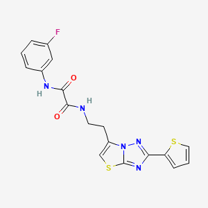 molecular formula C18H14FN5O2S2 B11257195 N1-(3-fluorophenyl)-N2-(2-(2-(thiophen-2-yl)thiazolo[3,2-b][1,2,4]triazol-6-yl)ethyl)oxalamide 