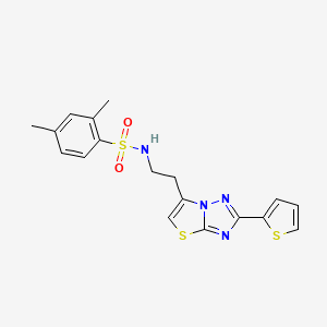 molecular formula C18H18N4O2S3 B11259827 2,4-dimethyl-N-(2-(2-(thiophen-2-yl)thiazolo[3,2-b][1,2,4]triazol-6-yl)ethyl)benzenesulfonamide 