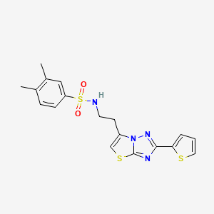 molecular formula C18H18N4O2S3 B11260291 3,4-dimethyl-N-(2-(2-(thiophen-2-yl)thiazolo[3,2-b][1,2,4]triazol-6-yl)ethyl)benzenesulfonamide 