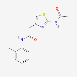 molecular formula C14H15N3O2S B11273478 2-(2-acetamidothiazol-4-yl)-N-(o-tolyl)acetamide 