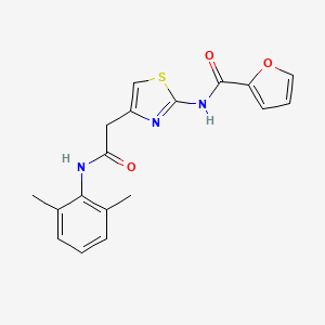 molecular formula C18H17N3O3S B11276144 N-(4-(2-((2,6-dimethylphenyl)amino)-2-oxoethyl)thiazol-2-yl)furan-2-carboxamide 