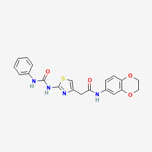 molecular formula C20H18N4O4S B11276946 N-(2,3-dihydrobenzo[b][1,4]dioxin-6-yl)-2-(2-(3-phenylureido)thiazol-4-yl)acetamide 