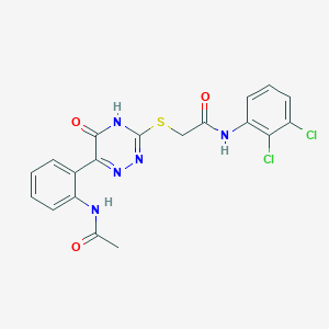 molecular formula C19H15Cl2N5O3S B11279075 N-(2,3-Dichlorophenyl)-2-{[6-(2-acetamidophenyl)-5-oxo-4,5-dihydro-1,2,4-triazin-3-YL]sulfanyl}acetamide 