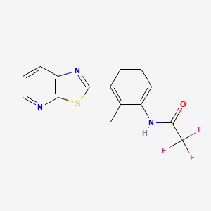 molecular formula C15H10F3N3OS B11284041 2,2,2-trifluoro-N-(2-methyl-3-(thiazolo[5,4-b]pyridin-2-yl)phenyl)acetamide 