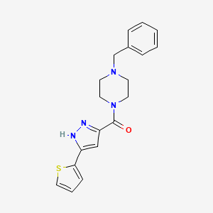 molecular formula C19H20N4OS B11285274 1-Benzyl-4-[3-(thiophen-2-YL)-1H-pyrazole-5-carbonyl]piperazine 