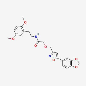 molecular formula C23H24N2O7 B11285370 2-[[5-(Benzo[d][1,3]dioxol-5-yl)isoxazol-3-yl]methoxy]-N-(2,5-dimethoxyphenethyl)acetamide 