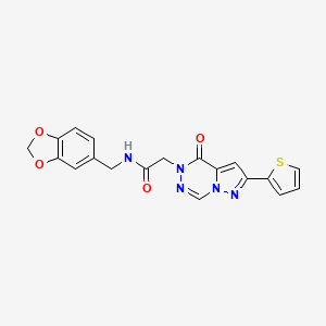 molecular formula C19H15N5O4S B11287828 N-(1,3-benzodioxol-5-ylmethyl)-2-[4-oxo-2-(thiophen-2-yl)pyrazolo[1,5-d][1,2,4]triazin-5(4H)-yl]acetamide 