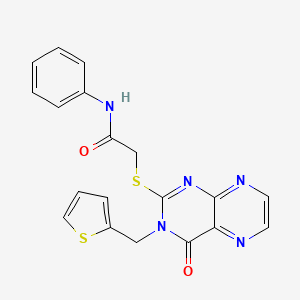 2-({4-oxo-3-[(thiophen-2-yl)methyl]-3,4-dihydropteridin-2-yl}sulfanyl)-N-phenylacetamide