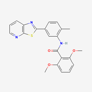 molecular formula C22H19N3O3S B11296459 2,6-dimethoxy-N-(2-methyl-5-(thiazolo[5,4-b]pyridin-2-yl)phenyl)benzamide 