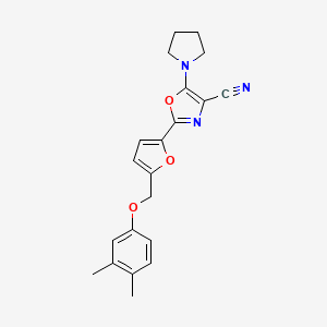 2-{5-[(3,4-Dimethylphenoxy)methyl]furan-2-yl}-5-(pyrrolidin-1-yl)-1,3-oxazole-4-carbonitrile