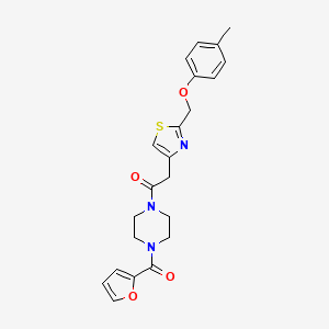 1-[4-(Furan-2-carbonyl)piperazin-1-YL]-2-{2-[(4-methylphenoxy)methyl]-1,3-thiazol-4-YL}ethan-1-one