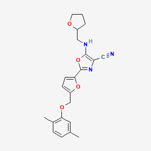 molecular formula C22H23N3O4 B11320941 2-{5-[(2,5-Dimethylphenoxy)methyl]furan-2-yl}-5-[(tetrahydrofuran-2-ylmethyl)amino]-1,3-oxazole-4-carbonitrile 