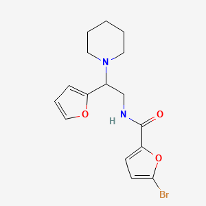 5-bromo-N-[2-(furan-2-yl)-2-(piperidin-1-yl)ethyl]furan-2-carboxamide