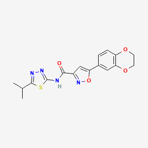 5-(2,3-dihydro-1,4-benzodioxin-6-yl)-N-[5-(propan-2-yl)-1,3,4-thiadiazol-2-yl]-1,2-oxazole-3-carboxamide