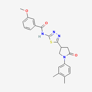 N-{5-[1-(3,4-dimethylphenyl)-5-oxopyrrolidin-3-yl]-1,3,4-thiadiazol-2-yl}-3-methoxybenzamide