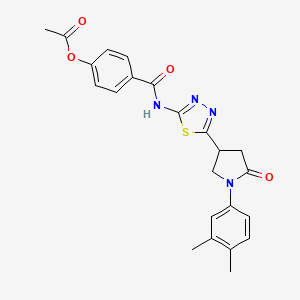 molecular formula C23H22N4O4S B11354962 4-({5-[1-(3,4-Dimethylphenyl)-5-oxopyrrolidin-3-yl]-1,3,4-thiadiazol-2-yl}carbamoyl)phenyl acetate 