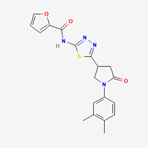 N-{5-[1-(3,4-dimethylphenyl)-5-oxopyrrolidin-3-yl]-1,3,4-thiadiazol-2-yl}furan-2-carboxamide