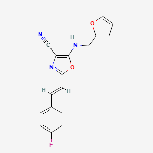 2-[(E)-2-(4-fluorophenyl)ethenyl]-5-[(furan-2-ylmethyl)amino]-1,3-oxazole-4-carbonitrile