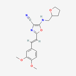 molecular formula C19H21N3O4 B11376010 2-[(E)-2-(3,4-dimethoxyphenyl)ethenyl]-5-[(tetrahydrofuran-2-ylmethyl)amino]-1,3-oxazole-4-carbonitrile 